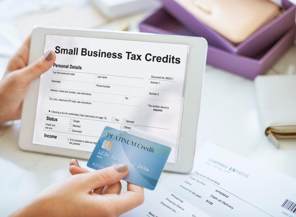 Small Business Tax Credits Claim Return Deduction Refund Concept