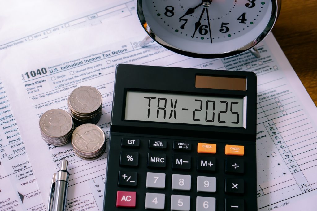 Word Tax 2025 on the calculator on documents.Income Statement. paying the tax rate. Taxation.